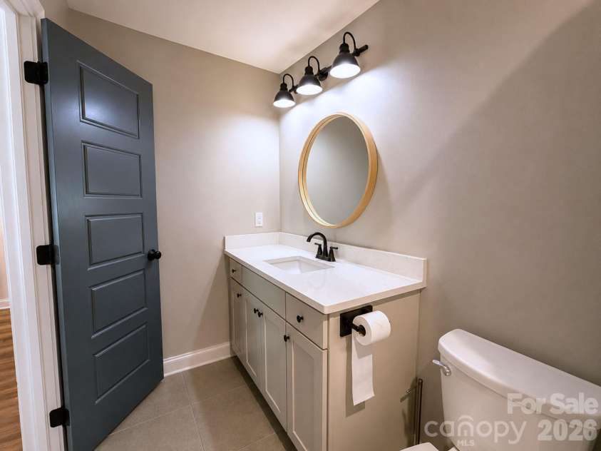 521 Johnson Street, Chester, SC 29706.  MLS# CAR4400310, YatesRealty ID 34869. Primary Bathroom – Well-appointed en-suite bath featuring a spacious vanity with solid-surface countertop, modern fixtures, and generous storage.
