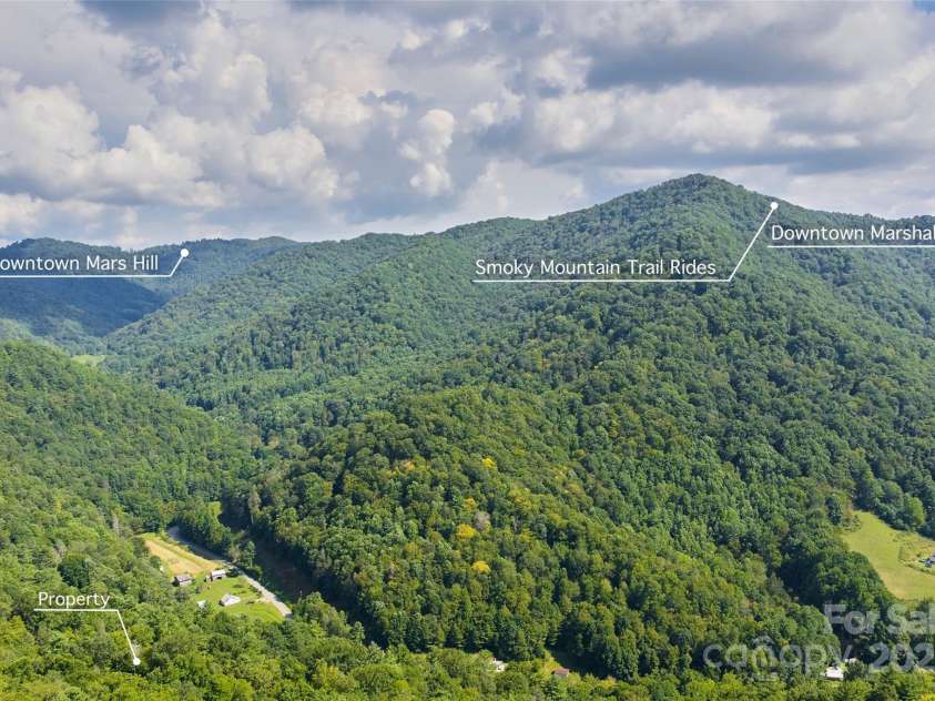 12215 Big Laurel Road, Marshall, NC 28753.  MLS# CAR4289922, YatesRealty ID 34872. Getaway mountain retreat with access to plenty of outdoor activities and cool Mountain towns