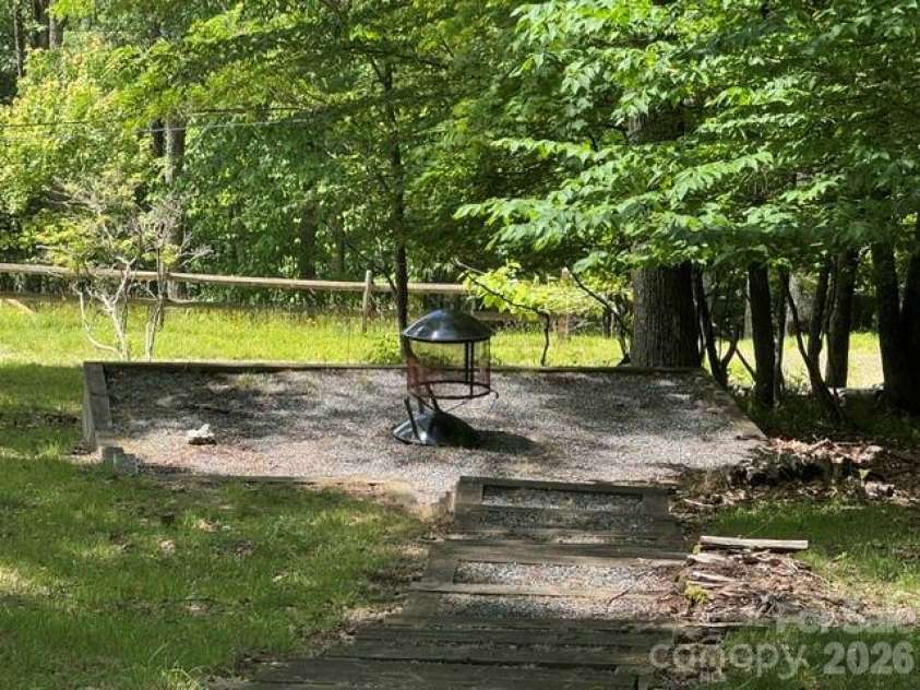 671 Trillium Lane, Mars Hill, NC 28754.  MLS# CAR4398850, YatesRealty ID 34879. Fire Pit Area