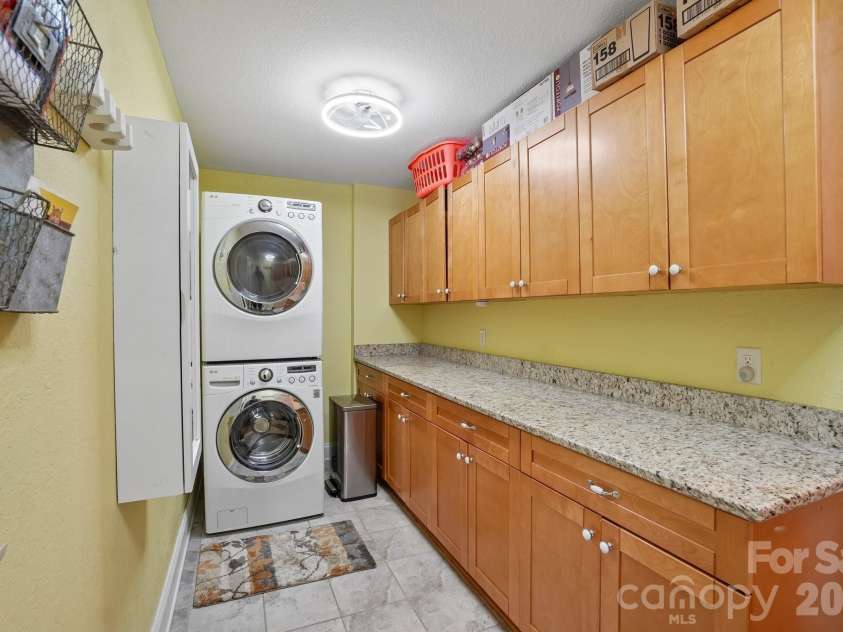 671 Trillium Lane, Mars Hill, NC 28754.  MLS# CAR4398850, YatesRealty ID 34879. Laundry Main Level
