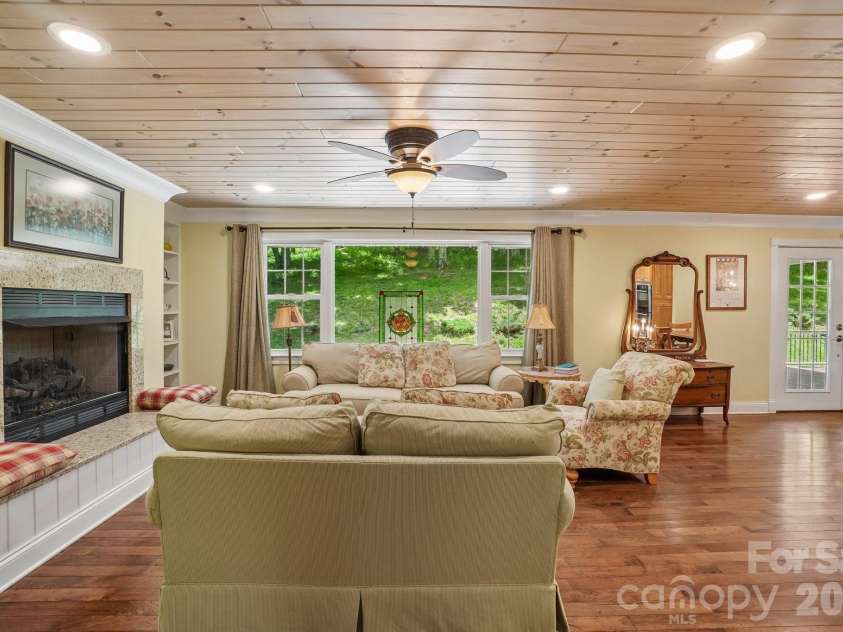 671 Trillium Lane, Mars Hill, NC 28754.  MLS# CAR4398850, YatesRealty ID 34879. Living Room w/T&G Ceiling