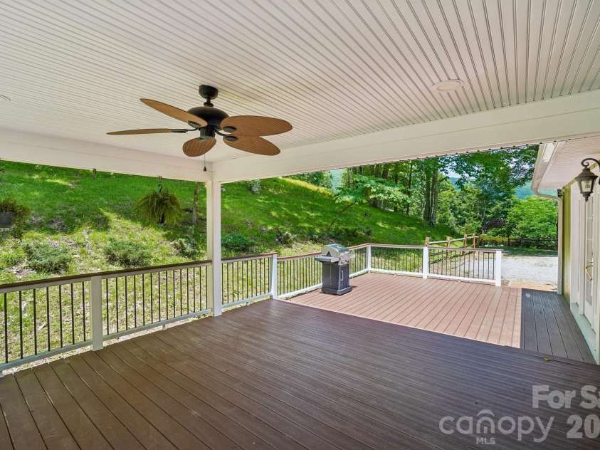 671 Trillium Lane, Mars Hill, NC 28754.  MLS# CAR4398850, YatesRealty ID 34879. Rear Deck/Patio Covered