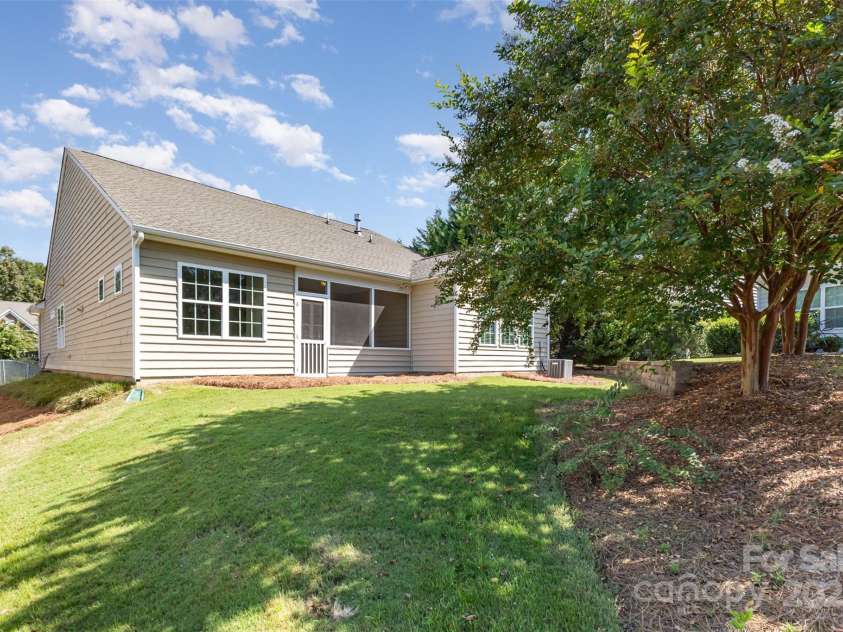 6007 Edinburgh Lane, Fort Mill, SC 29707.  MLS# CAR4295658, YatesRealty ID 34881. Back of home