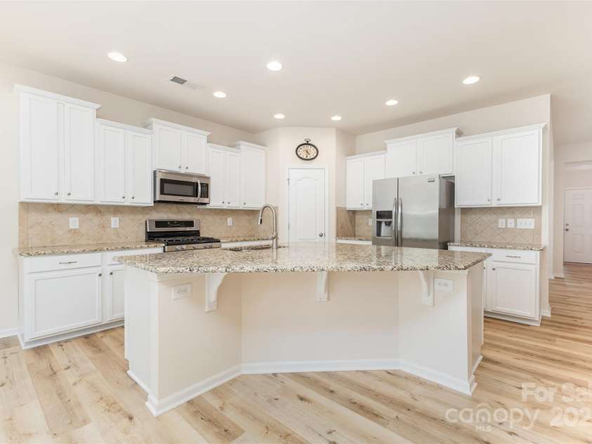 6007 Edinburgh Lane, Fort Mill, SC 29707.  MLS# CAR4295658, YatesRealty ID 34881. Freshly painted kitchen cabinets.