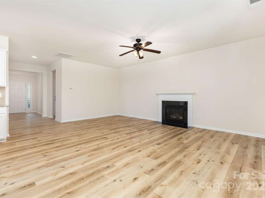 6007 Edinburgh Lane, Fort Mill, SC 29707.  MLS# CAR4295658, YatesRealty ID 34881. Gas fireplace for cozy evenings.