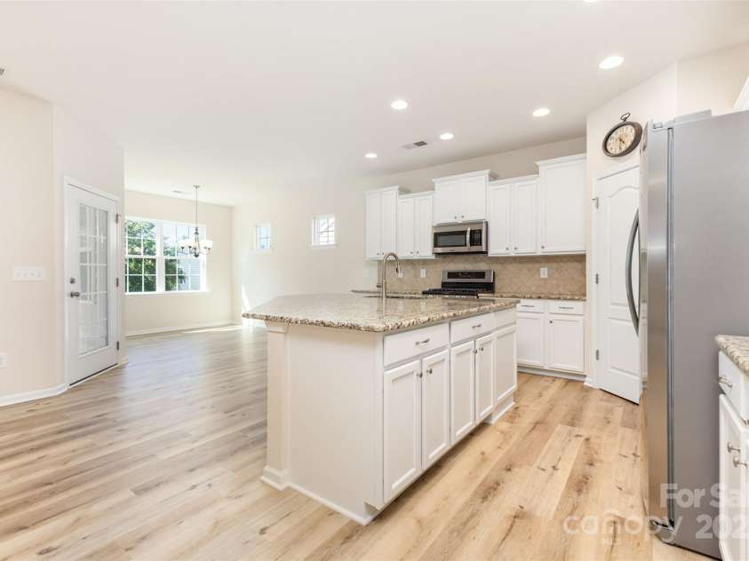 6007 Edinburgh Lane, Fort Mill, SC 29707.  MLS# CAR4295658, YatesRealty ID 34881. Informal dining just off the kitchen is part of the open concept floor plan