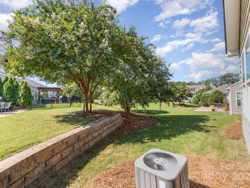 6007 Edinburgh Lane, Fort Mill, SC 29707.  MLS# CAR4295658, YatesRealty ID 34881. Part of the backyard