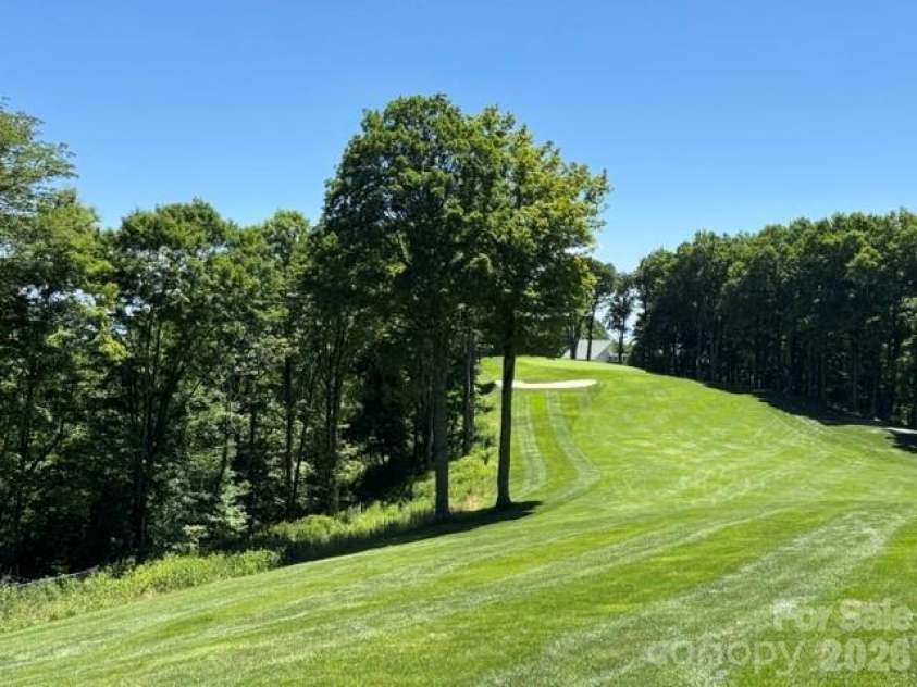 1209 Mckinney Gap Drive, Mars Hill, NC 28754.  MLS# CAR4399695, YatesRealty ID 34886. On Golf Course
