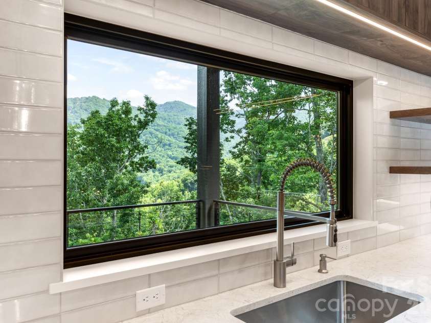 60 King Horn Ridge, Waynesville, NC 28785.  MLS# CAR4389004, YatesRealty ID 34887. Kitchen sink window view.