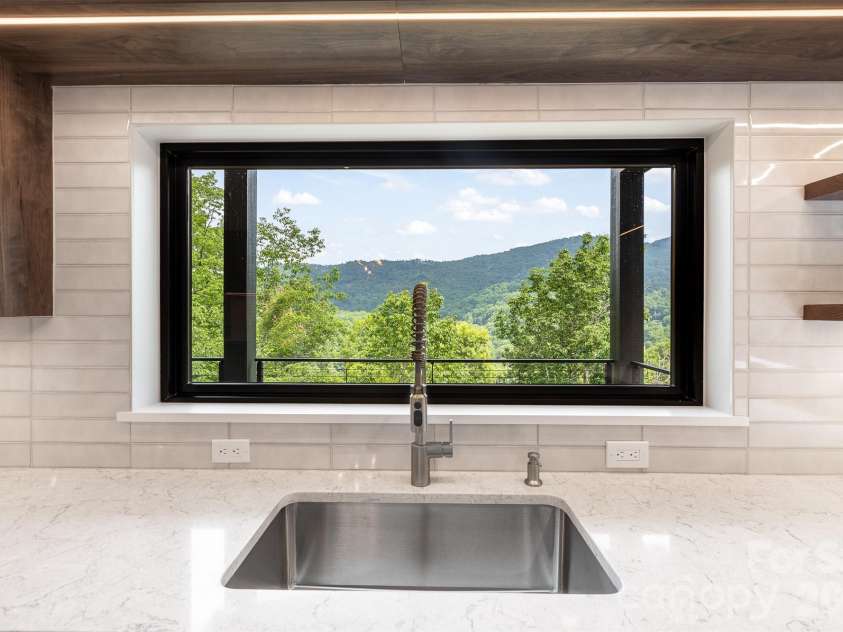 60 King Horn Ridge, Waynesville, NC 28785.  MLS# CAR4389004, YatesRealty ID 34887. Kitchen sink window view.