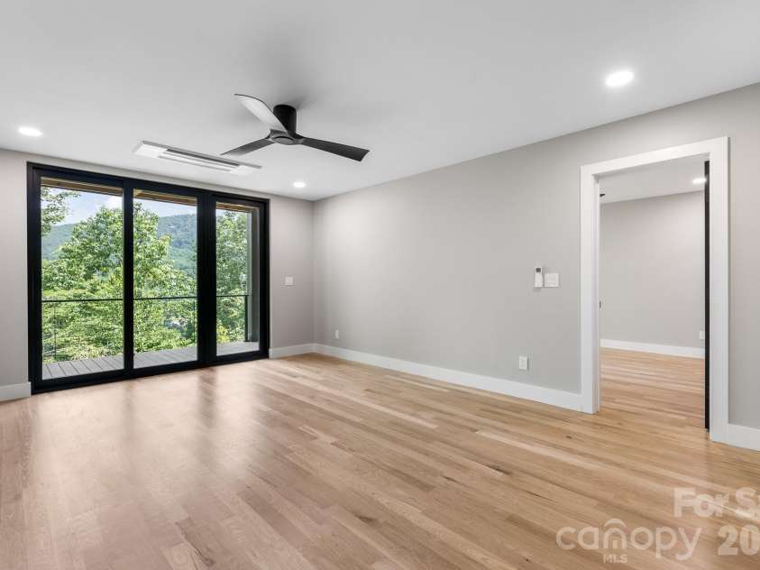 60 King Horn Ridge, Waynesville, NC 28785.  MLS# CAR4389004, YatesRealty ID 34887. Lower family room 2.