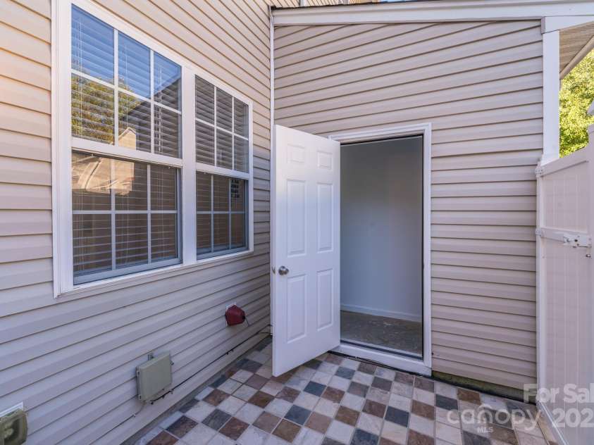 563 Goldstaff Lane, Charlotte, NC 28273.  MLS# CAR4191069, YatesRealty ID 3489. Fenced and private back patio