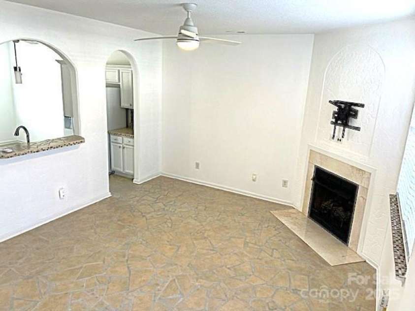 563 Goldstaff Lane, Charlotte, NC 28273.  MLS# CAR4191069, YatesRealty ID 3489. Livingroom with gas fireplace