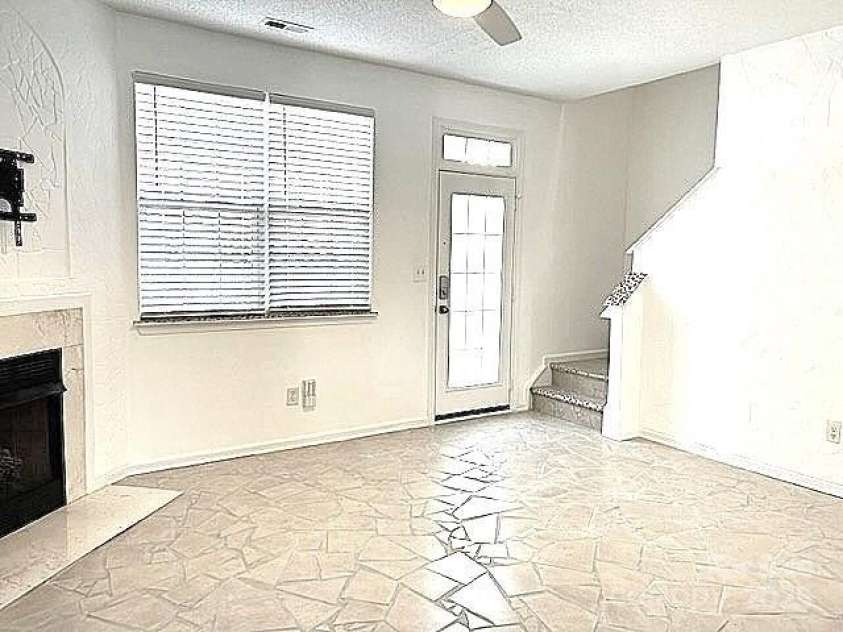 563 Goldstaff Lane, Charlotte, NC 28273.  MLS# CAR4191069, YatesRealty ID 3489. Livingroom with gas fireplace