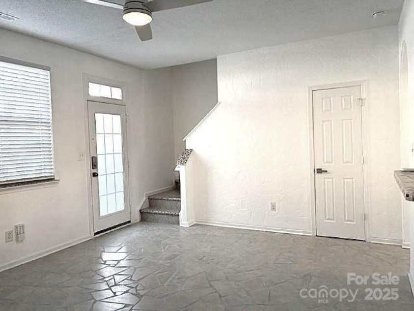 563 Goldstaff Lane, Charlotte, NC 28273.  MLS# CAR4191069, YatesRealty ID 3489. Livingroom with gas fireplace