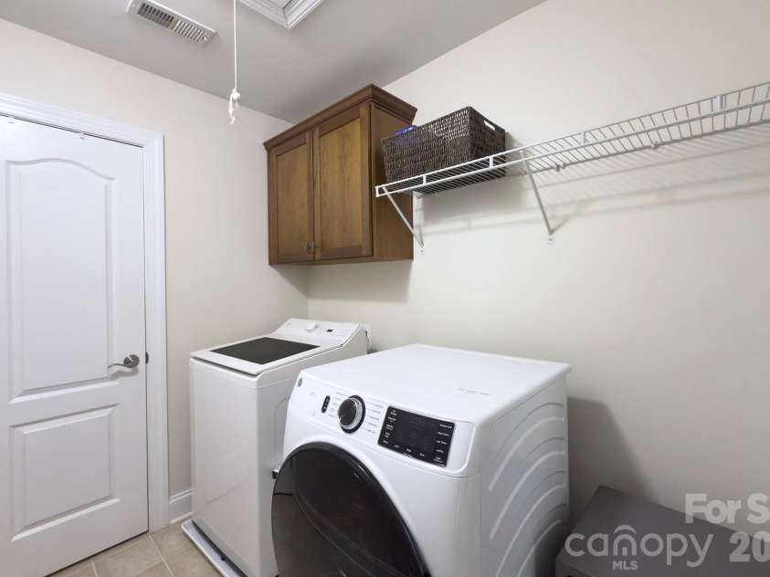 3011 Crismark Drive, Indian Trail, NC 28079.  MLS# CAR4400449, YatesRealty ID 34899. Second floor laundry room