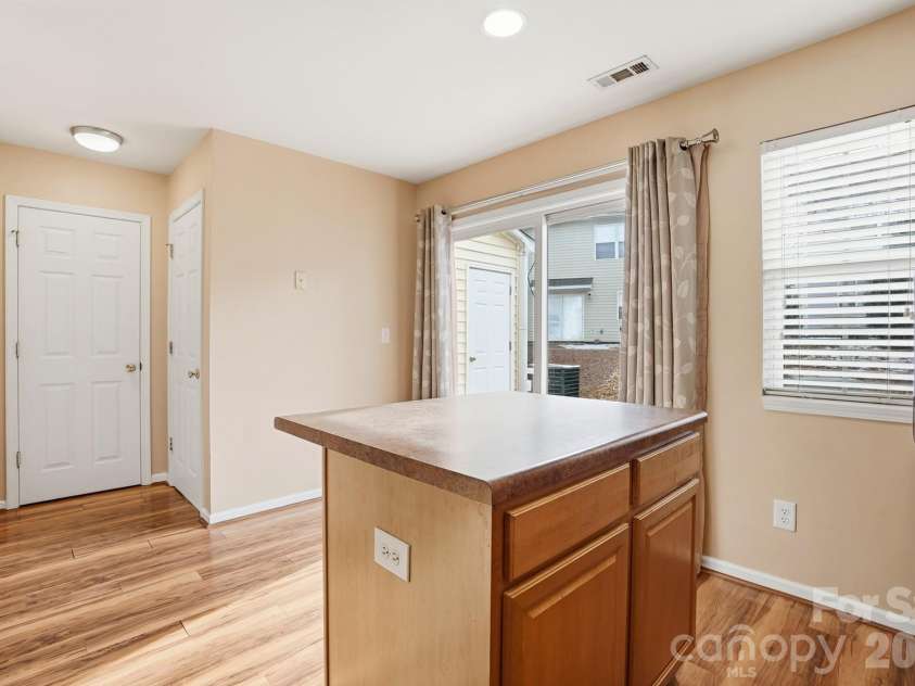 3569 Draycott Avenue, Charlotte, NC 28213.  MLS# CAR4341865, YatesRealty ID 3490. The kitchen features a convenient center island, providing extra prep space and a great spot for casual dining
