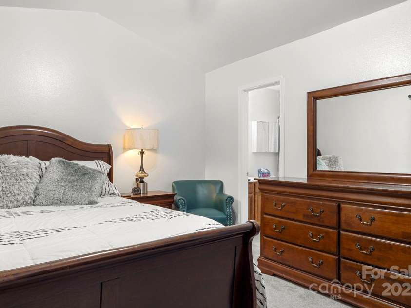 8211 Carob Tree Lane, Charlotte, NC 28215.  MLS# CAR4297175, YatesRealty ID 34900. Primary bedroom