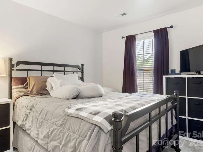 8211 Carob Tree Lane, Charlotte, NC 28215.  MLS# CAR4297175, YatesRealty ID 34900. Secondary bedroom