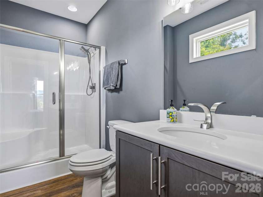 11 Timber Hill Drive, Leicester, NC 28748.  MLS# CAR4395563, YatesRealty ID 34902. Terrace level ensuite bath.