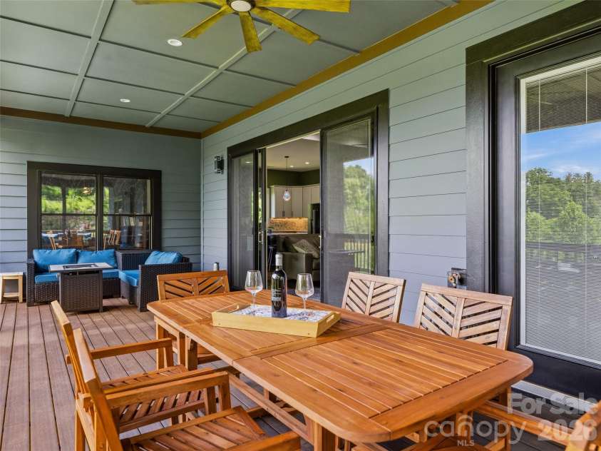 11 Timber Hill Drive, Leicester, NC 28748.  MLS# CAR4395563, YatesRealty ID 34902. The deck provides ample space for relaxing, dining and grilling.