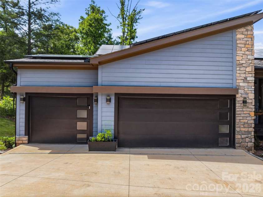 11 Timber Hill Drive, Leicester, NC 28748.  MLS# CAR4395563, YatesRealty ID 34902. Three car garage with EV charger.