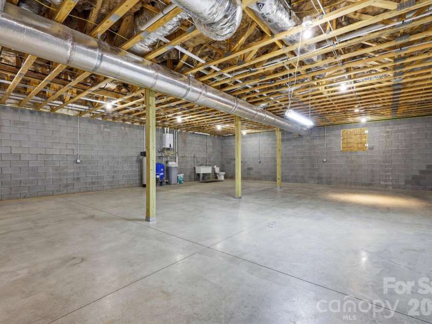 41 Bell Sprinkle Road, Weaverville, NC 28787.  MLS# CAR4391644, YatesRealty ID 34903. Unfinished basement - plumbed for multiple bathrooms