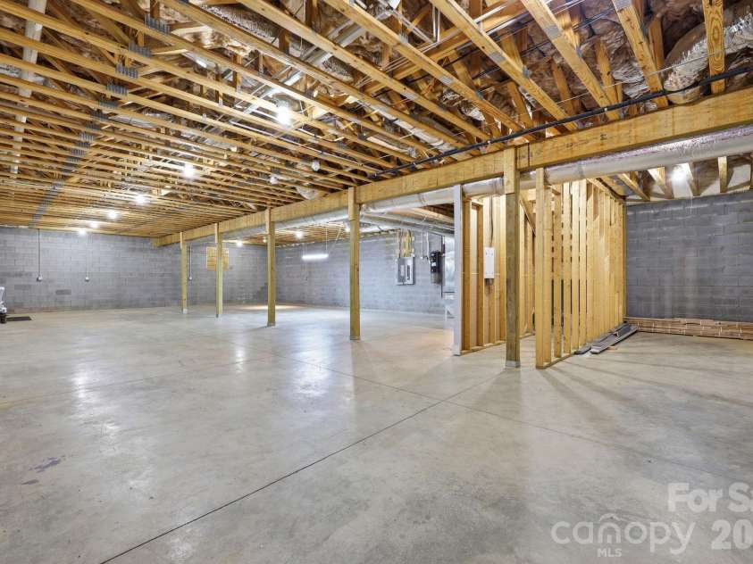 41 Bell Sprinkle Road, Weaverville, NC 28787.  MLS# CAR4391644, YatesRealty ID 34903. Unfinished basement - plumbed fr multiple bathrooms