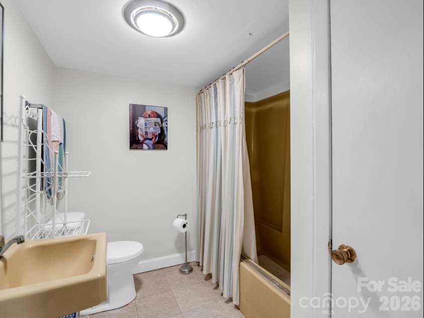 390 Mountain Laurel Drive, Columbus, NC 28722.  MLS# CAR4399139, YatesRealty ID 34904. Basement full bathroom