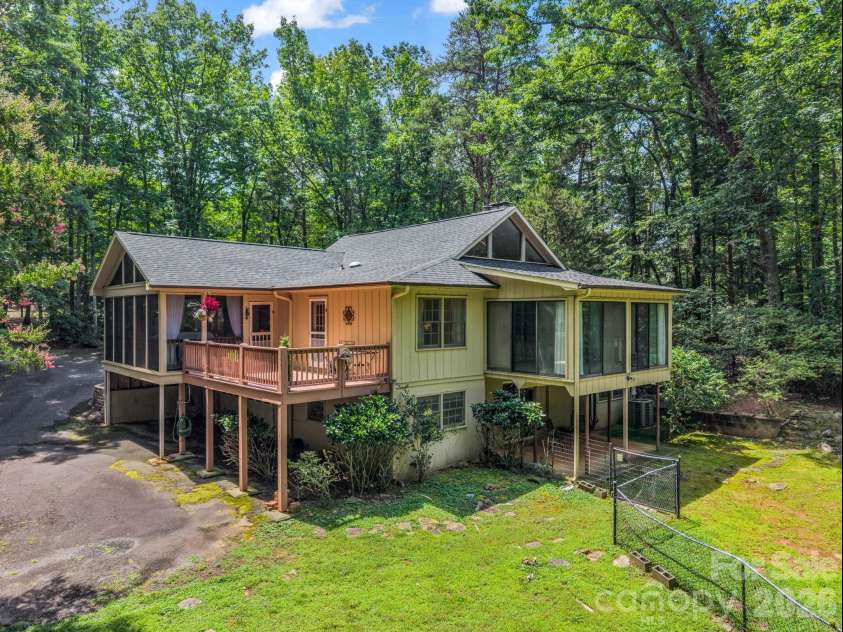 390 Mountain Laurel Drive, Columbus, NC 28722.  MLS# CAR4399139, YatesRealty ID 34904. Basement level 2-car garage on the left