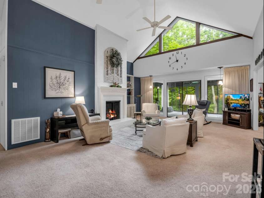 390 Mountain Laurel Drive, Columbus, NC 28722.  MLS# CAR4399139, YatesRealty ID 34904. Living room with vaulted ceiling