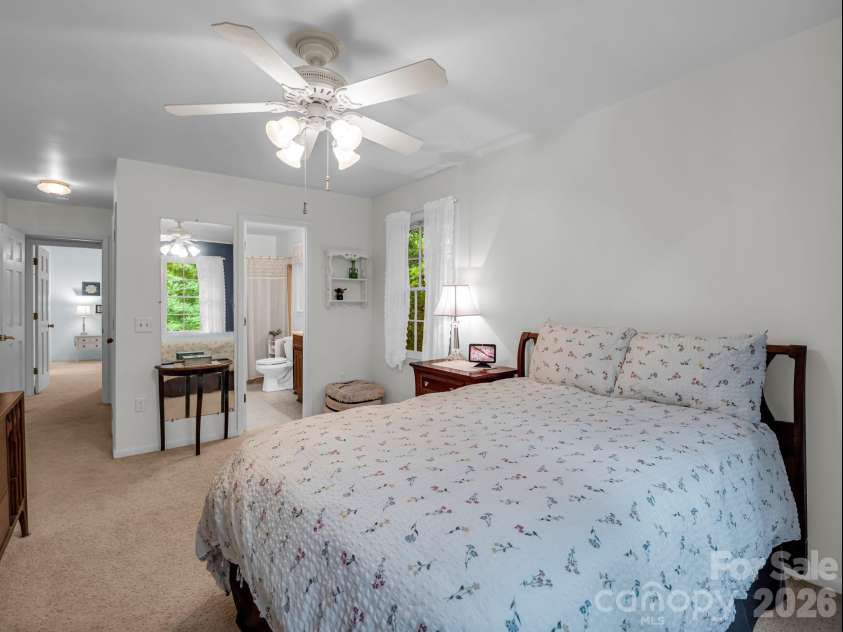 390 Mountain Laurel Drive, Columbus, NC 28722.  MLS# CAR4399139, YatesRealty ID 34904. Primary bedroom with attached bathroom