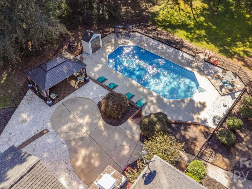 15655 Highway 601 Highway, Midland, NC 28107.  MLS# CAR4302018, YatesRealty ID 34905. Aerial Pool View
