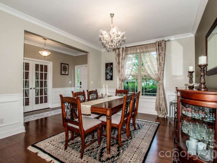 130 Eagles Landing Drive, Mooresville, NC 28117.  MLS# CAR4407110, YatesRealty ID 34907. Beautiful wainscoting in dining room