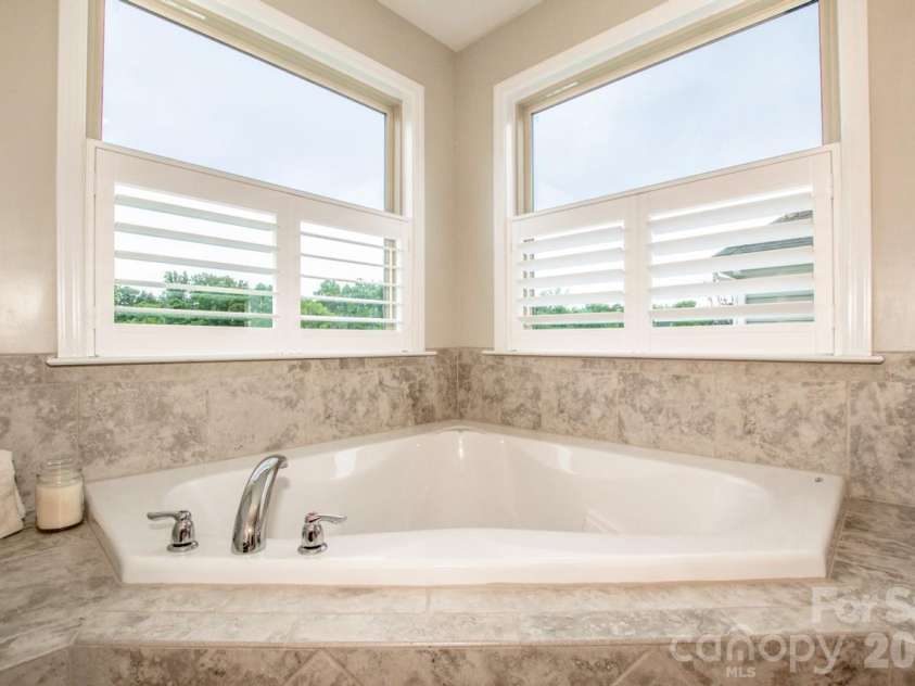 130 Eagles Landing Drive, Mooresville, NC 28117.  MLS# CAR4407110, YatesRealty ID 34907. Plantation blinds
