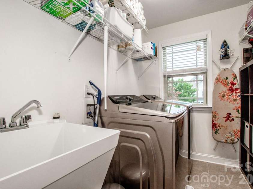 130 Eagles Landing Drive, Mooresville, NC 28117.  MLS# CAR4407110, YatesRealty ID 34907. Super spacious laundry room with a wash basin