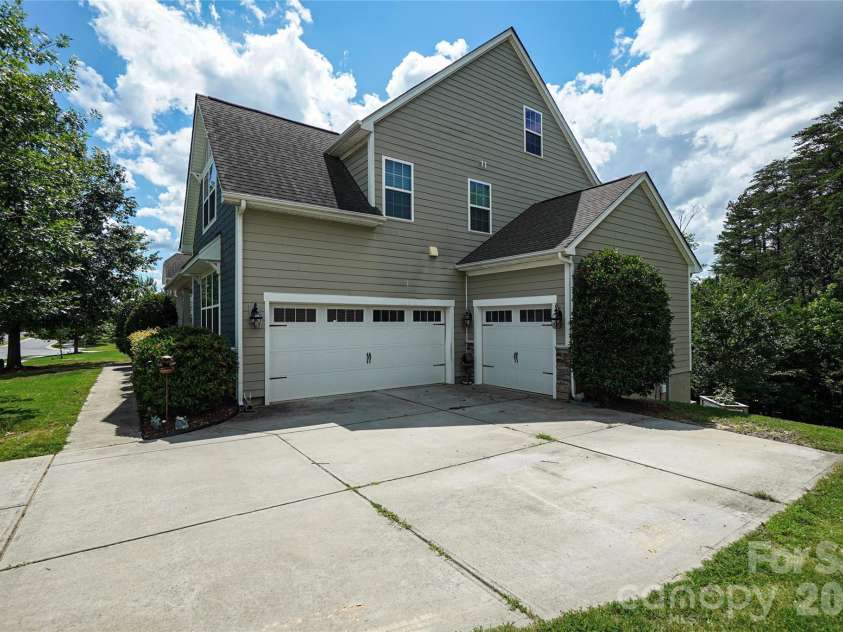 1238 Stonecrest Boulevard, Fort Mill, SC 29708.  MLS# CAR4394779, YatesRealty ID 34912. 3 car garage view