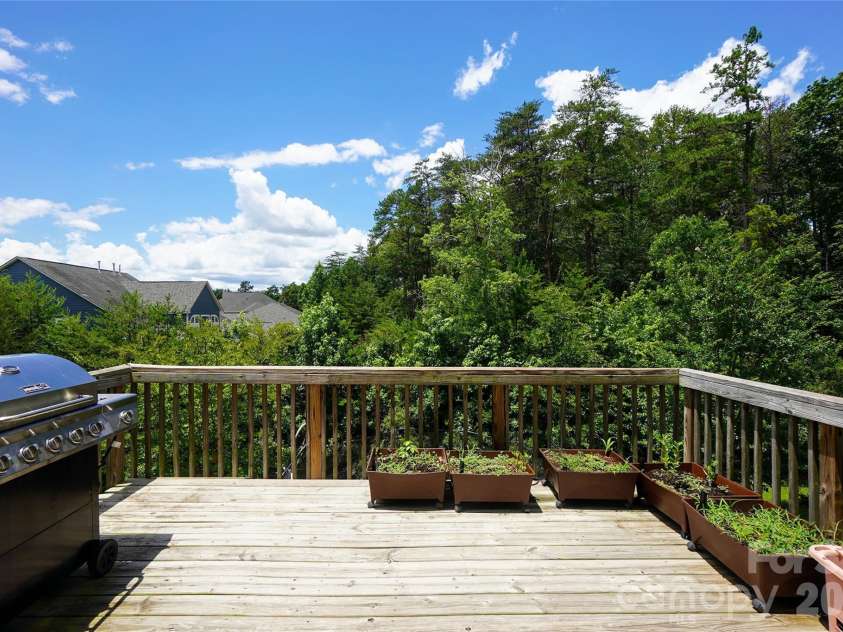 1238 Stonecrest Boulevard, Fort Mill, SC 29708.  MLS# CAR4394779, YatesRealty ID 34912. Elevated Deck off of Kitchen