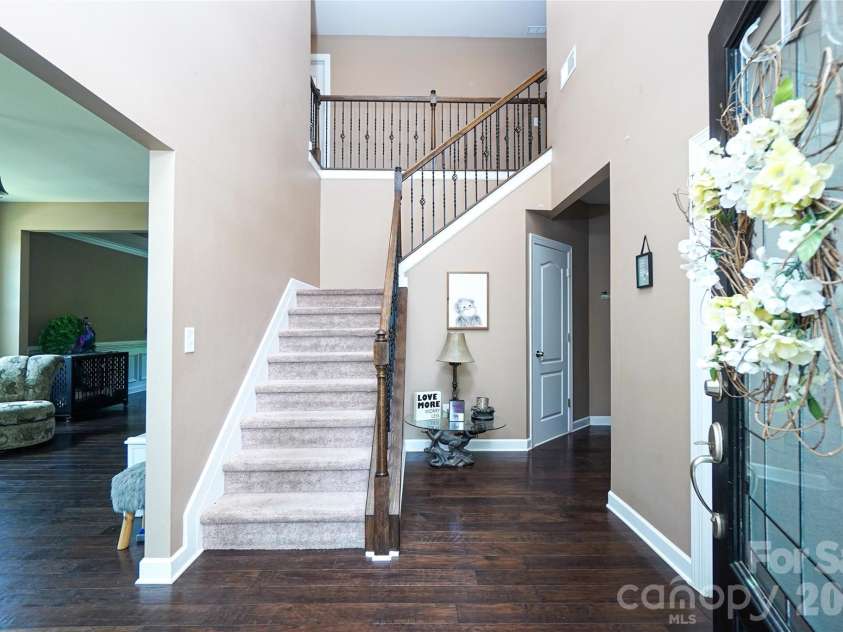 1238 Stonecrest Boulevard, Fort Mill, SC 29708.  MLS# CAR4394779, YatesRealty ID 34912. Stairs to 2nd level