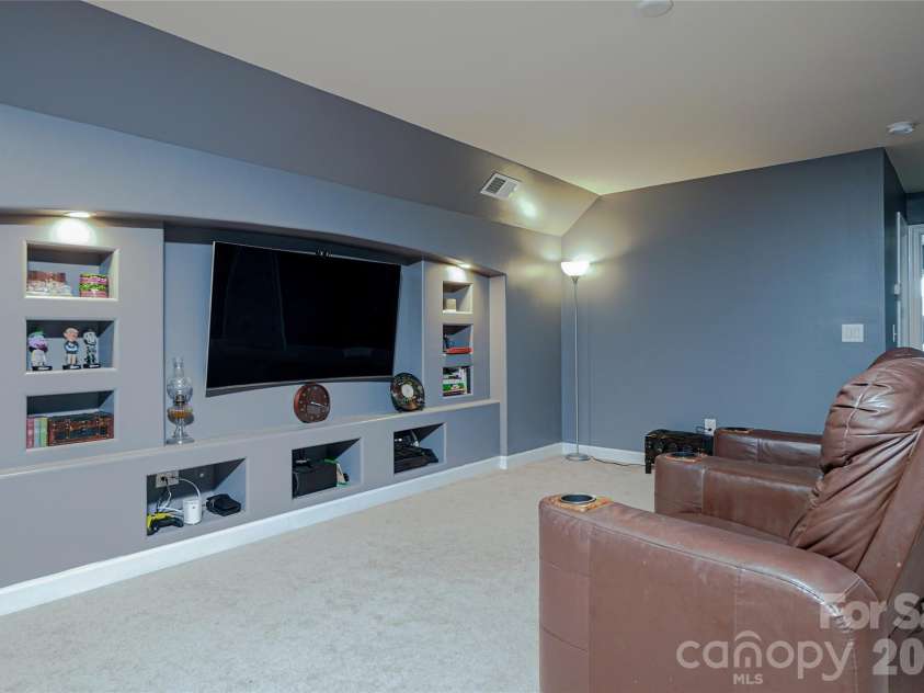 1238 Stonecrest Boulevard, Fort Mill, SC 29708.  MLS# CAR4394779, YatesRealty ID 34912. Upper Screening Room