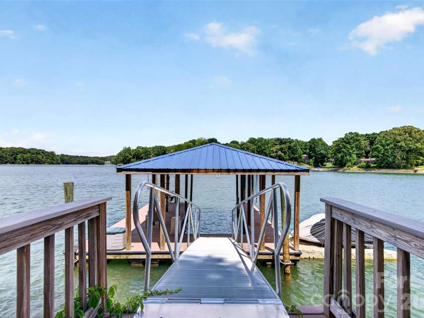 1390 Langdon Road, Sherrills Ford, NC 28673.  MLS# CAR4396931, YatesRealty ID 34916. Covered dock