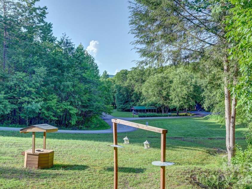 124 Small Creek Drive, Lake Lure, NC 28746.  MLS# CAR4396298, YatesRealty ID 34920. Front Yard View