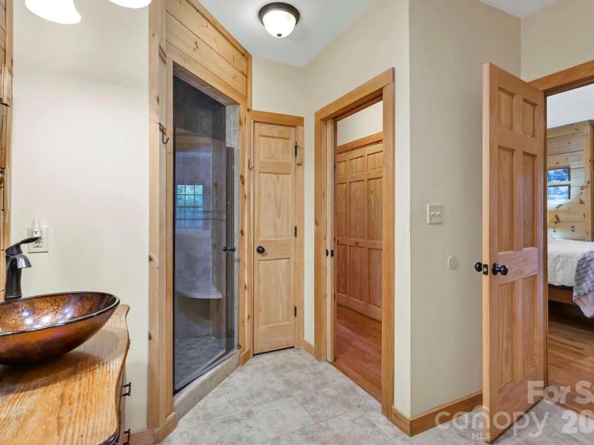 124 Small Creek Drive, Lake Lure, NC 28746.  MLS# CAR4396298, YatesRealty ID 34920. Primary Bath