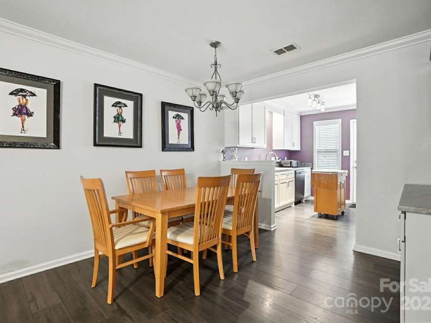 6523 Point Comfort Lane, Charlotte, NC 28226.  MLS# CAR4297368, YatesRealty ID 34920. Dining large enough for your big table and hutch