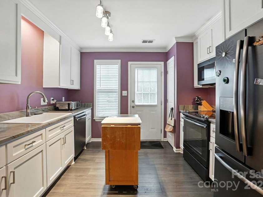 6523 Point Comfort Lane, Charlotte, NC 28226.  MLS# CAR4297368, YatesRealty ID 34920. Incredible custom kitchen renovation with room for all your countertop appliance storage!