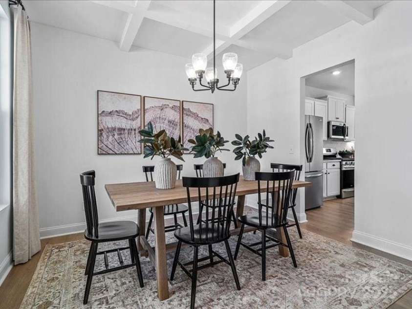 136 Ella Claire Drive, York, SC 29745.  MLS# CAR4187874, YatesRealty ID 3493. PHOTO REPRESENTATION ONLY. Dining room of decorated model home.