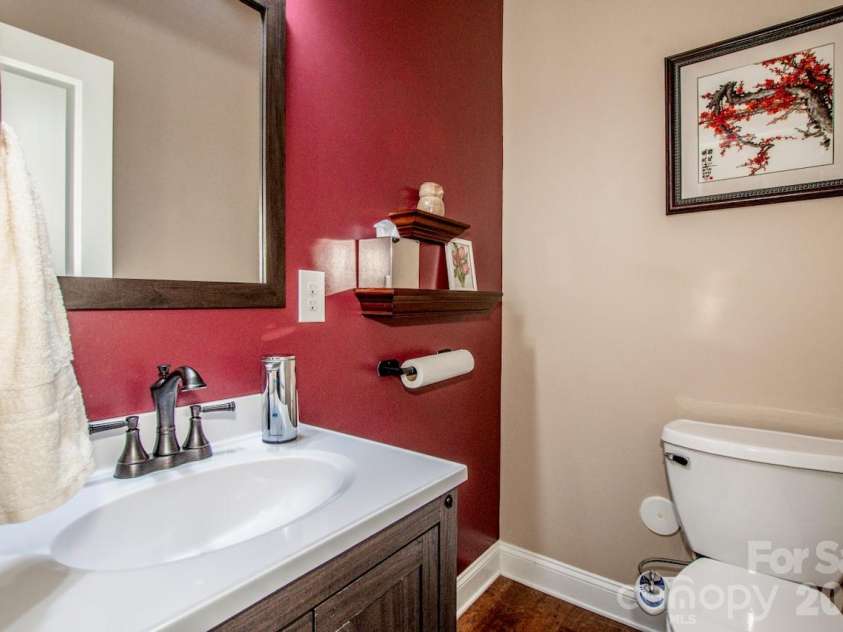 158 Eagles Landing Drive, Mooresville, NC 28117.  MLS# CAR4408144, YatesRealty ID 34930. Half bath on main floor