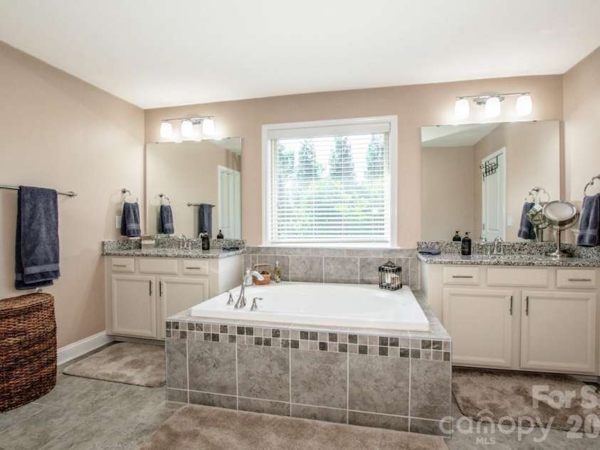 158 Eagles Landing Drive, Mooresville, NC 28117.  MLS# CAR4408144, YatesRealty ID 34930. Spacious primary bathroom