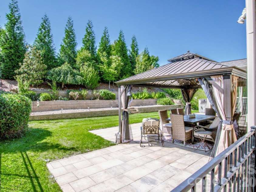 158 Eagles Landing Drive, Mooresville, NC 28117.  MLS# CAR4408144, YatesRealty ID 34930. Stunning backyard patio