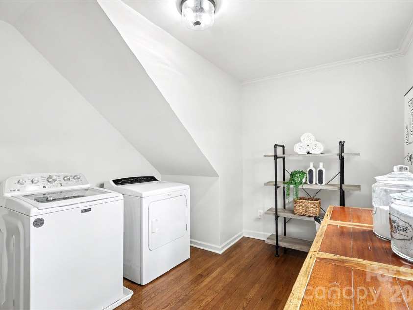 3834 Moultrie Street, Charlotte, NC 28209.  MLS# CAR4398282, YatesRealty ID 34938. Laundry room with folding table